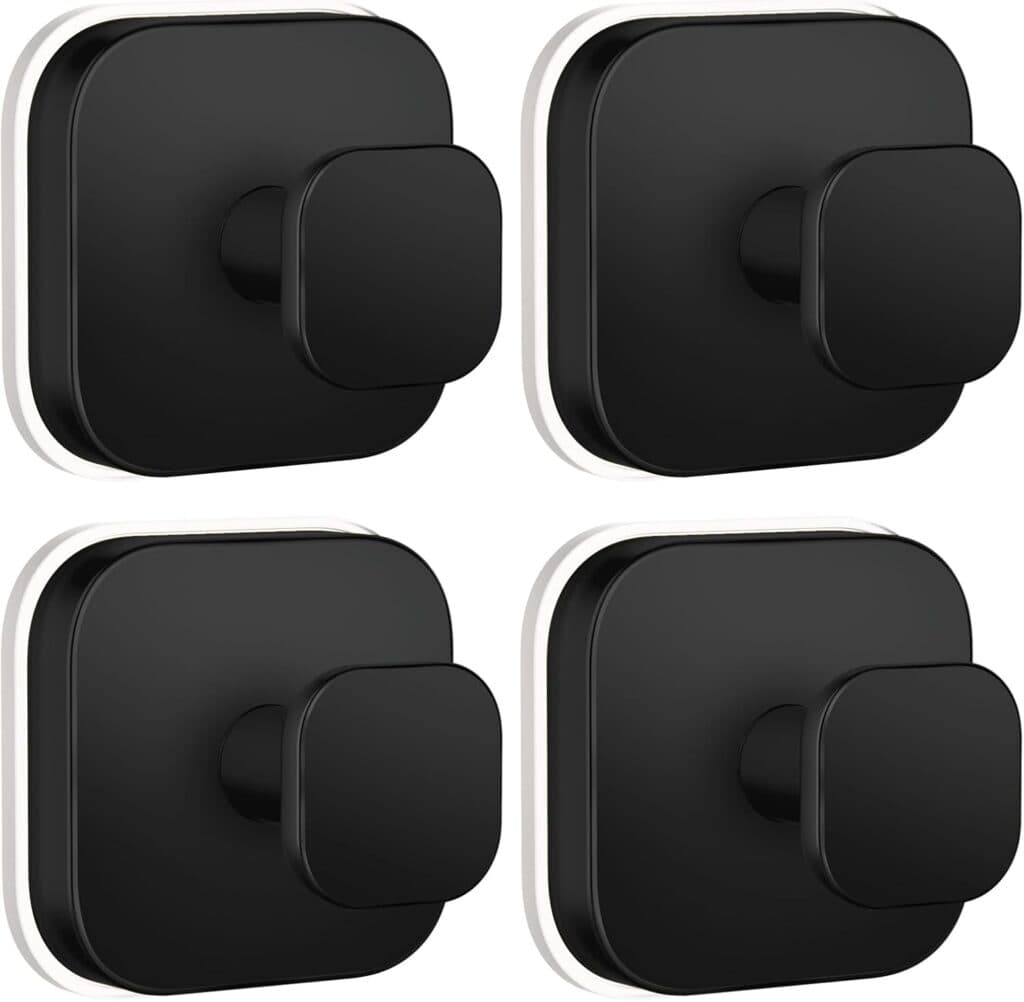 Four identical black square cabinet locks with rounded edges and central rotating knobs, arranged in a 2x2 grid on a white background.