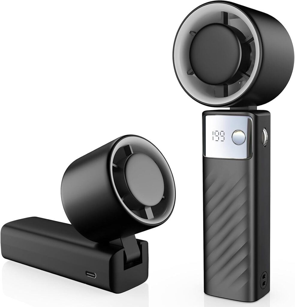 Two sleek, black handheld electronic devices with circular fan-like tops; one stands upright showing a digital display reading “1.93”, while the other lies flat with a USB-C charging port—ideal picks for this week’s Tuesday Deals.