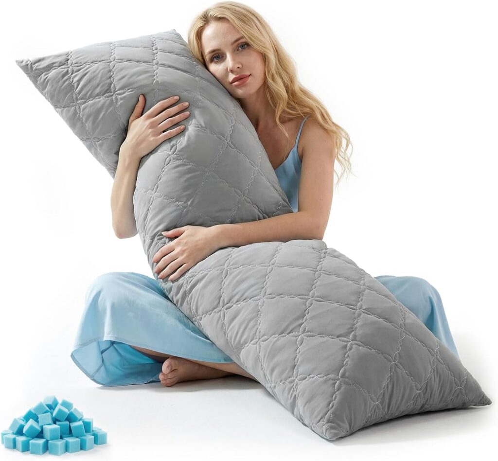 A woman in a light blue dress sits on the floor, hugging a large gray quilted body pillow. Blue cooling gel cubes are displayed in the corner of the image, highlighting exclusive Wednesday Deals for cool comfort.