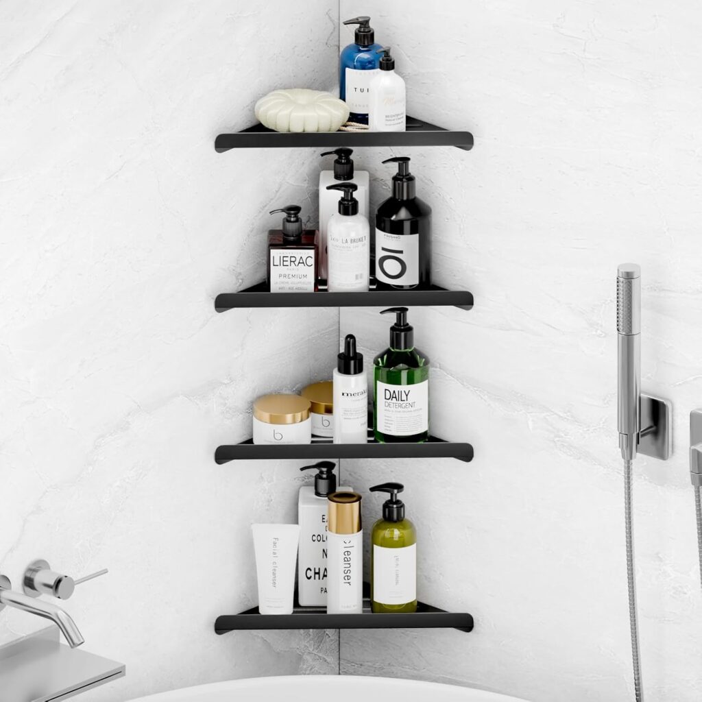 A black, four-tier corner shelf in a white bathroom holds various bottles of soap, shampoo, and skincare products. A showerhead and bathtub faucet are visible nearby.