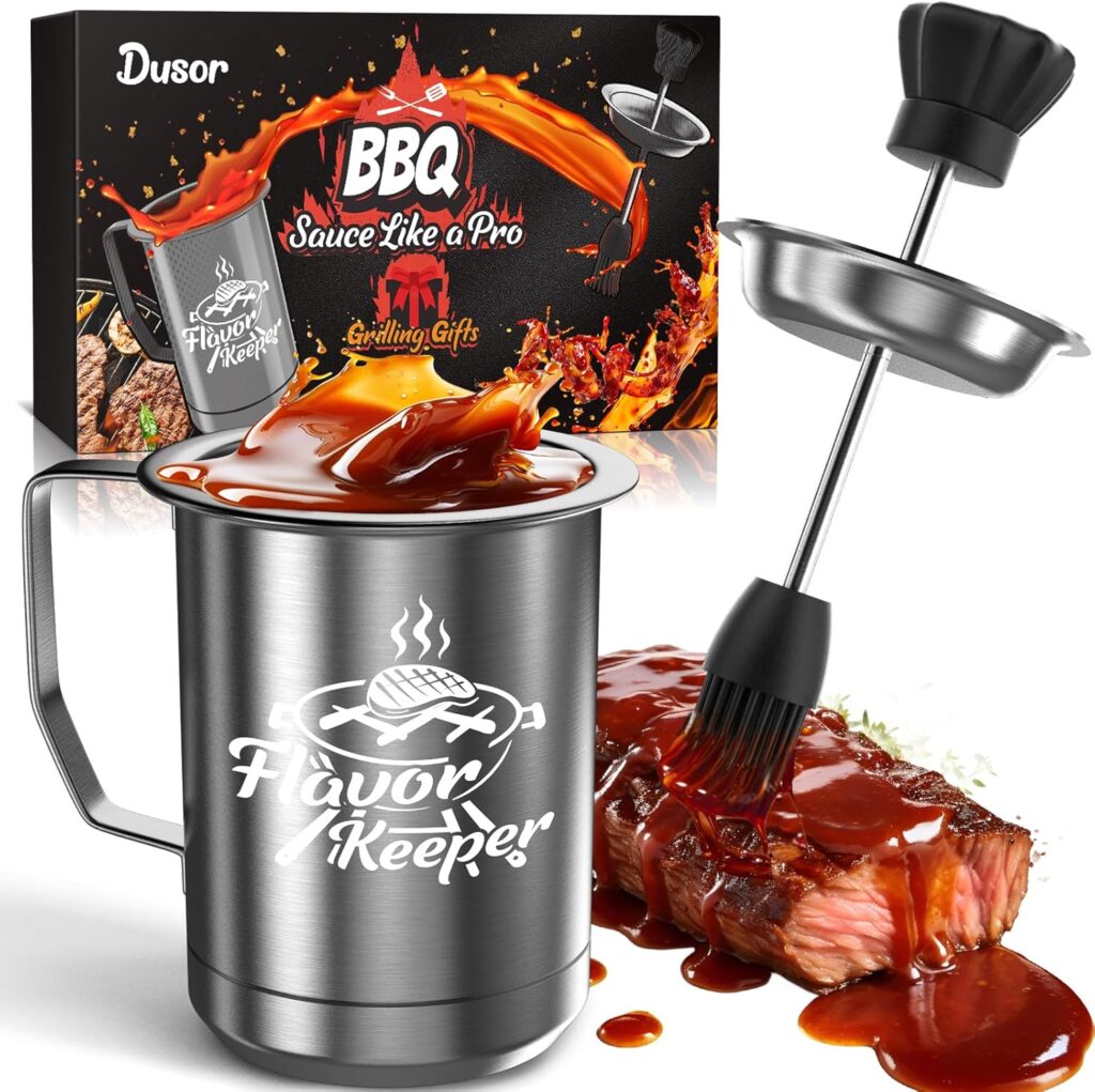 A stainless steel mug labeled "Flavor Keeper" filled with BBQ sauce, a basting brush dripping sauce over steak, and a product box with "BBQ Sauce Like a Pro" and flame graphics in the background—perfect for snagging in our Tuesday Deals!.
