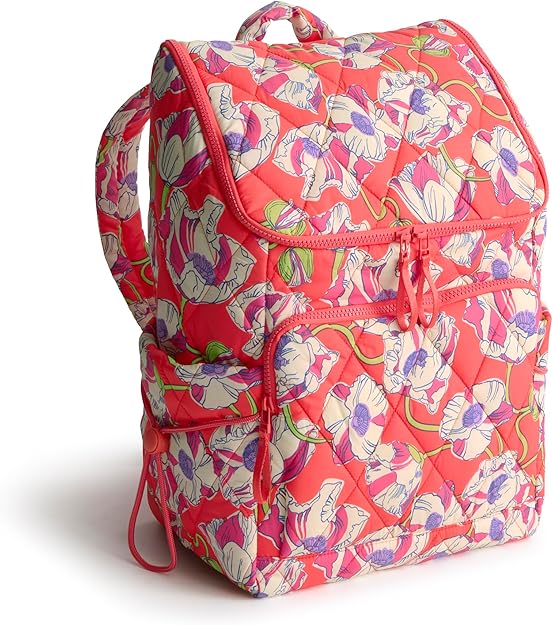 A colorful quilted backpack with a pink background and a floral pattern in white, purple, and green. Features two zippered compartments, padded shoulder straps, and is perfect for snagging on Wednesday Deals.