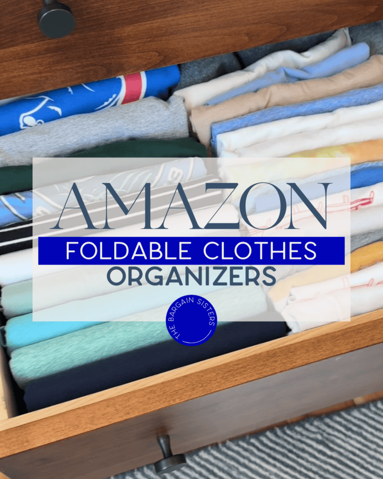 An open wooden drawer neatly filled with folded clothes in organizers. Overlay text reads "Amazon Foldable Clothes Organizers" with a small circular logo at the bottom.