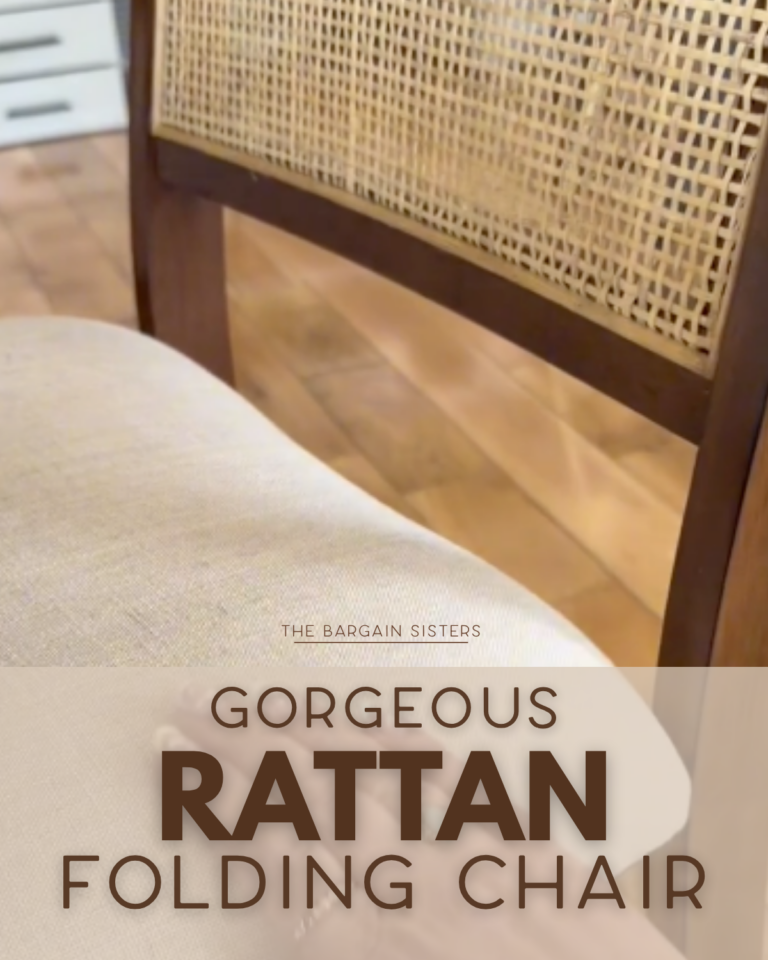 Close-up view of a folding chair with a woven rattan backrest and a cushioned seat, placed on a wooden floor. Text overlay reads: "Gorgeous Rattan Folding Chair.