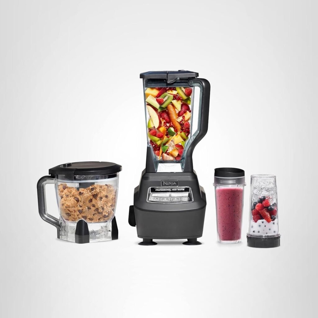A black blender with a clear jar filled with mixed fruit stands center, surrounded by a food processor with cookie dough, a smoothie cup with a red drink, and a smaller cup with yogurt and berries—all showcased for Thursday Deals on a light background.