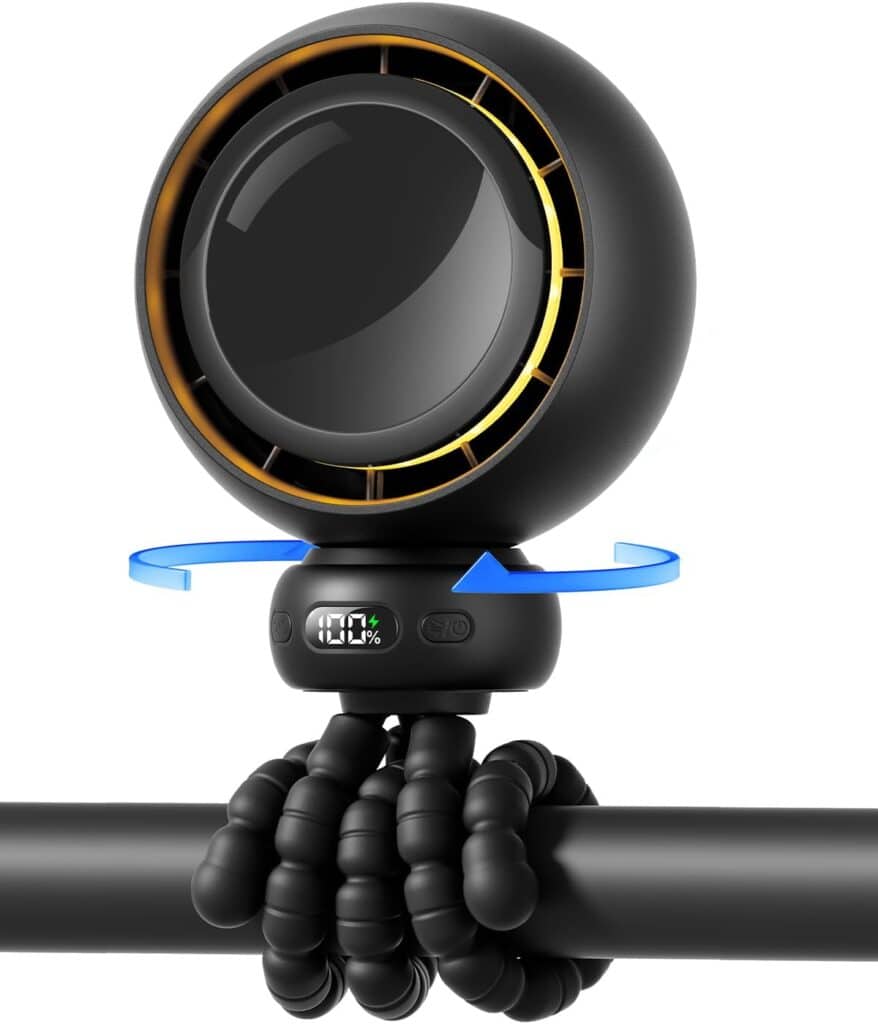 A small, black, spherical fan with gold accents and a digital display is mounted on a flexible tripod stand wrapped around a horizontal bar. Blue arrows indicate the fan's rotation.