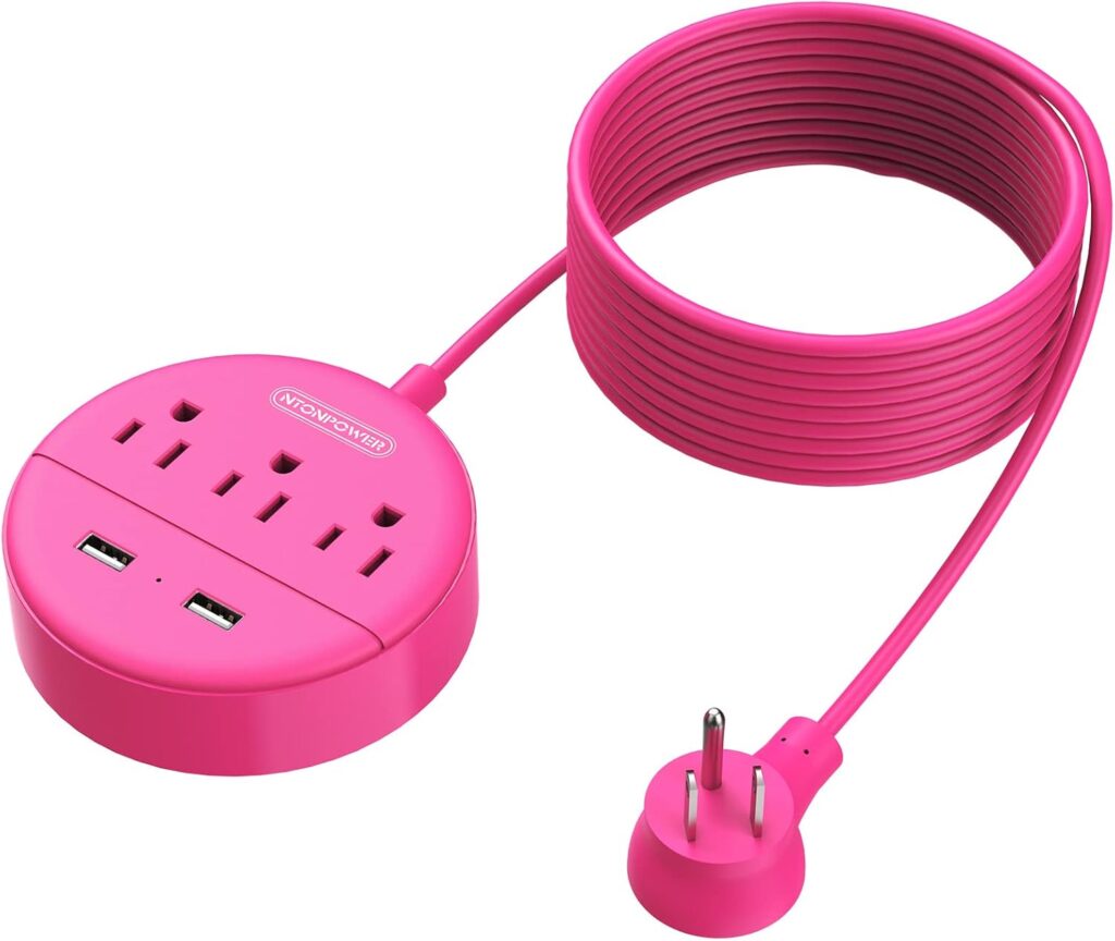 A round, bright pink power strip with three electrical outlets, two USB ports, and a long matching extension cord ending in a two-prong plug is coiled neatly beside the strip—perfect for powering up during Thursday Deals.