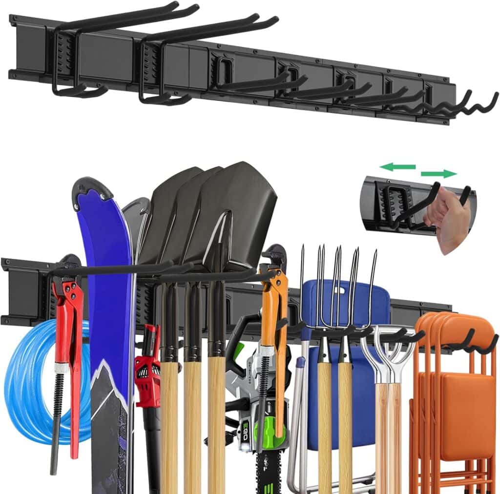 A heavy-duty wall-mounted storage rack holds various tools and equipment, including shovels, rakes, a hose, a snowboard, folding chairs, and more. An inset shows a close-up of the adjustable hook mechanism.