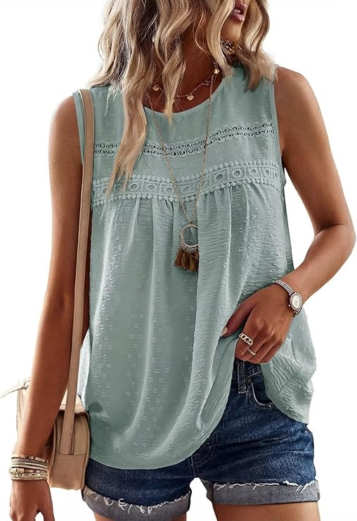Snag this look during Wednesday Deals: A woman wears a sleeveless light blue top with lace details, paired with denim shorts, layered necklaces, bracelets, a watch, rings, and carries a beige shoulder bag.
