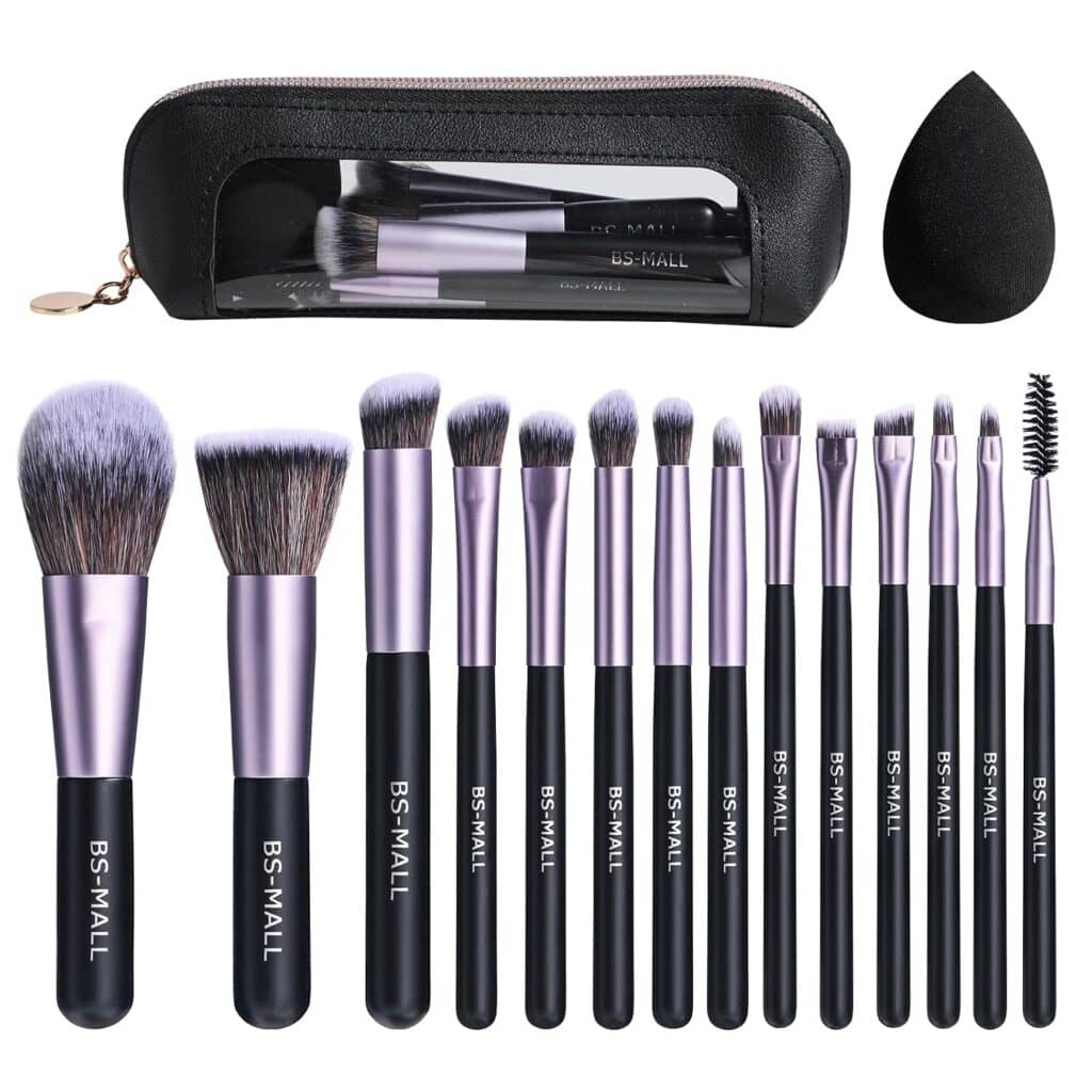 A set of 14 makeup brushes with black handles, a black makeup sponge, and a black storage pouch with a transparent section displaying brushes inside—perfect for grabbing during Tuesday Deals.