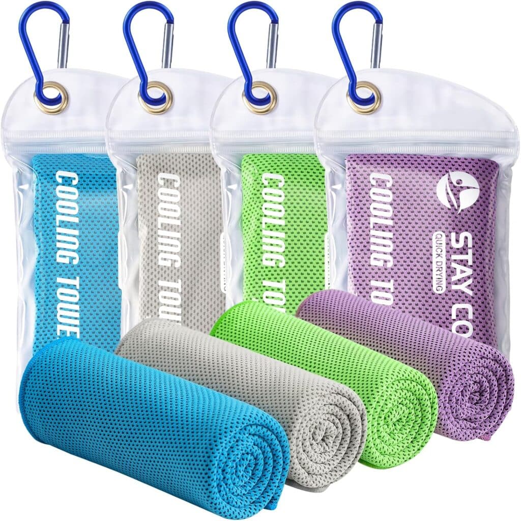 Four rolled cooling towels in blue, gray, green, and purple, each inside a transparent zippered pouch with a blue carabiner attached at the top. The towels have a mesh texture and are labeled “Cooling Towel.”.
