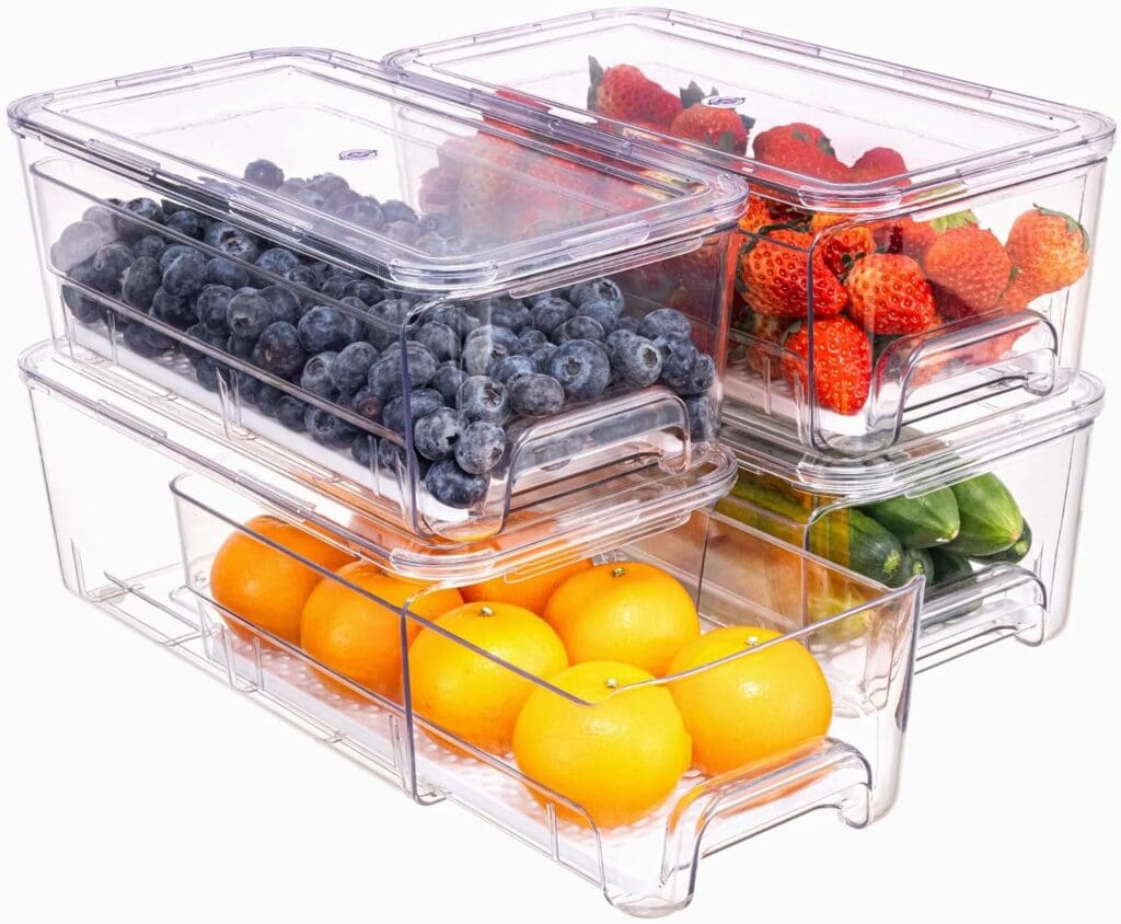 Four clear plastic storage bins filled with blueberries, strawberries, cucumbers, and oranges are stacked on top of each other against a white background—perfect for keeping your fresh finds from our Wednesday Deals organized and easy to access.