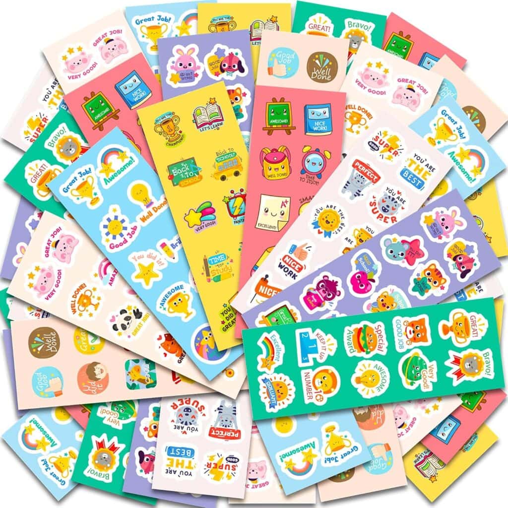 A colorful assortment of reward sticker sheets featuring cute animals, stars, books, and positive messages like “Great Job,” “Nice Work,” and “You’re Awesome.” The stickers are arranged in a fan shape.