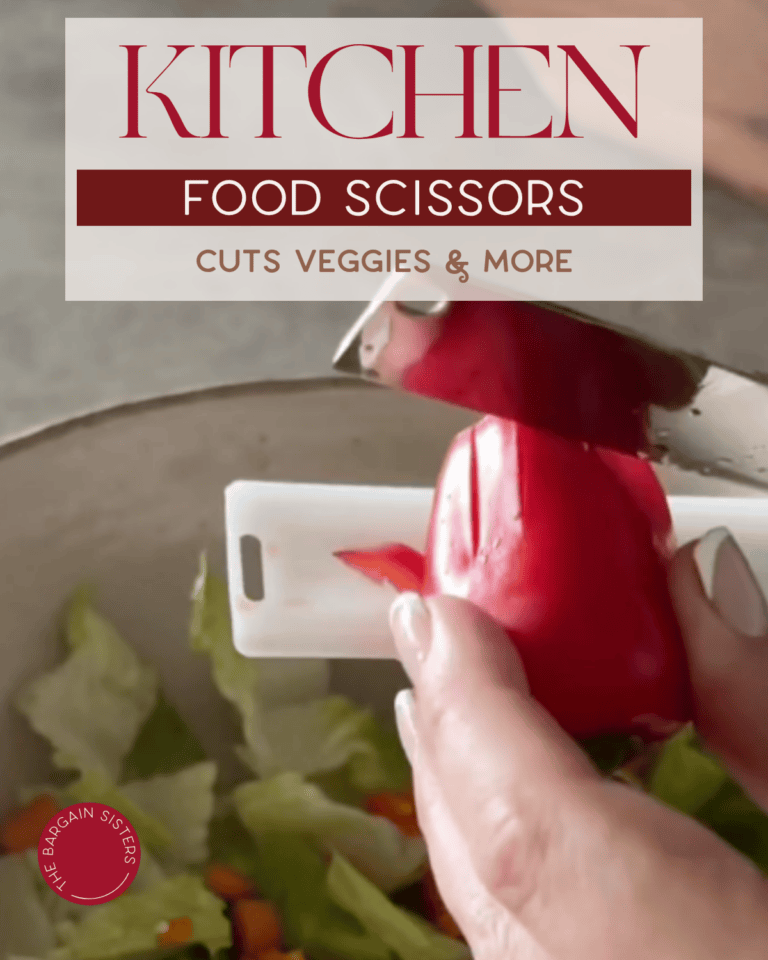 A hand uses kitchen food scissors to cut a red bell pepper over a bowl of salad with lettuce and carrots. Text at the top reads "Kitchen Food Scissors: Cuts Veggies & More.