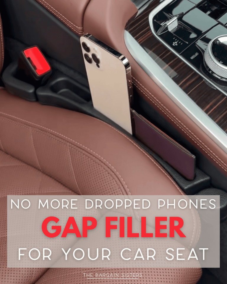 A gold smartphone and a card are placed in a gap filler organizer between a car seat and the center console. Text overlay reads: "No more dropped phones. Gap filler for your car seat.