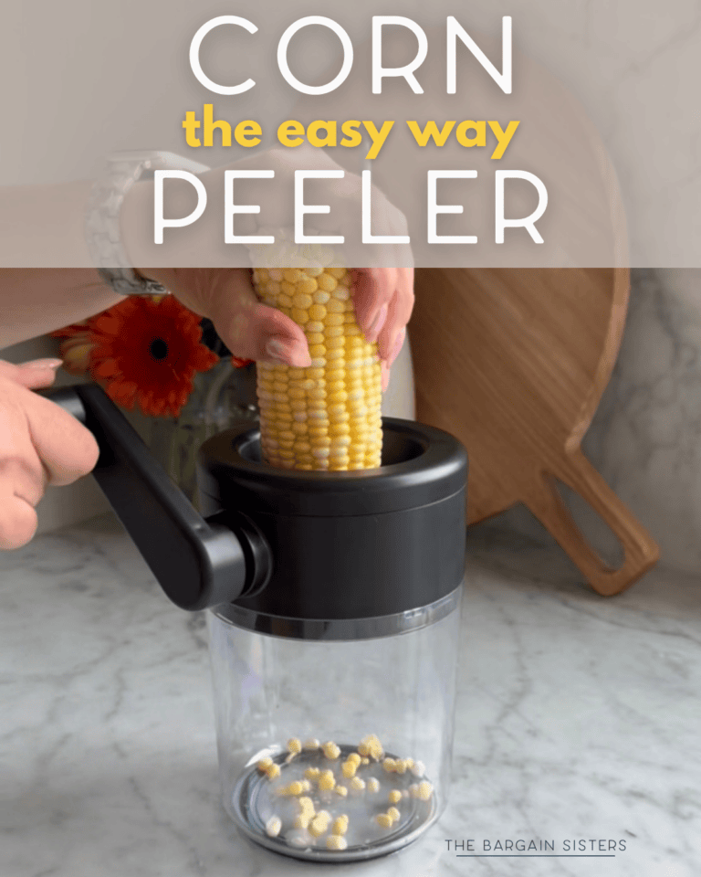 A hand uses a corn peeler tool to remove kernels from a cob over a clear container. Text above reads "CORN the easy way PEELER." A marble counter, flowers, and a cutting board are in the background.