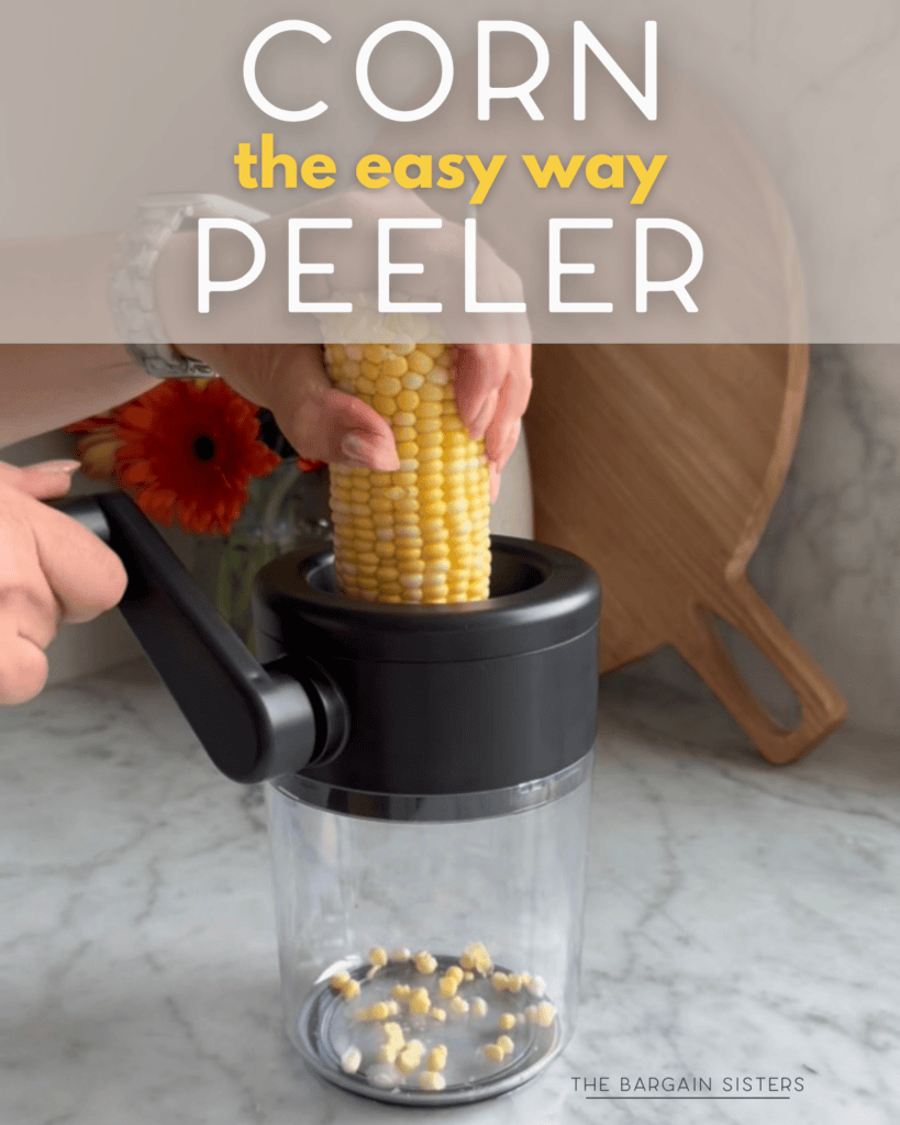 A hand uses a corn peeler tool to remove kernels from a cob over a clear container. Text above reads "CORN the easy way PEELER." A marble counter, flowers, and a cutting board are in the background.