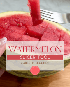 A fork lifts a cube of watermelon from a halved melon, showing evenly cut cubes. Text overlay reads: "WATERMELON SLICER TOOL - CUBES IN SECONDS" with a small logo at the bottom.