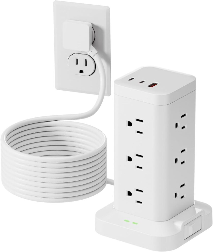 White power strip tower with multiple outlets and USB ports. The unit is plugged into a wall socket, and its long white cord is neatly coiled beside it. Two green indicator lights are on at the base, making this a smart choice for your home or office—especially with Friday Deals available now.