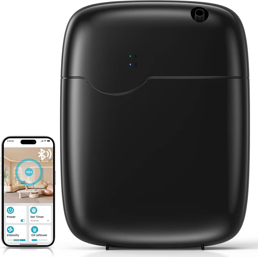A black essential oil diffuser with Bluetooth capability is shown next to a smartphone displaying its control app, featuring options for power, timer, intensity, and oil level—perfect for upgrading your space, especially during Friday Deals.