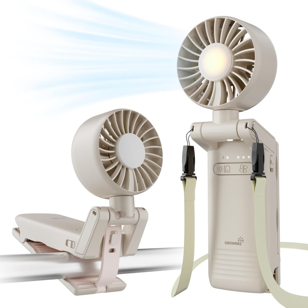Two portable beige fans, one standing upright with straps and the other clipped to a rod. Blue lines show airflow from the upright fan. Both fans have circular blades and compact designs.
