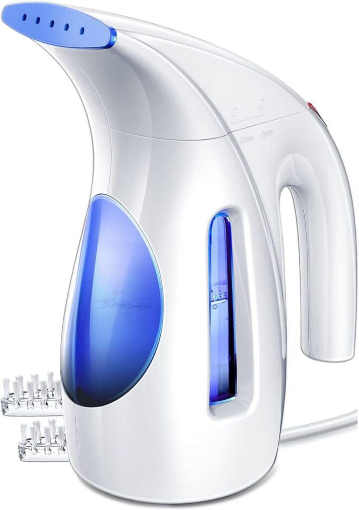 A white and blue handheld clothes steamer with a transparent water tank, steam vents at the tip, and a power cord, designed for removing wrinkles from garments.