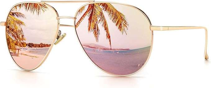 Gold aviator sunglasses with lenses reflecting a tropical beach scene, showing palm trees, sand, and the ocean under a partly cloudy sky.