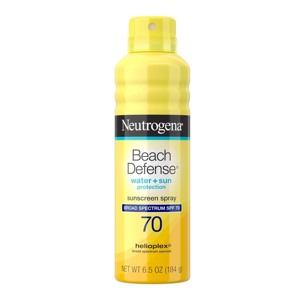 A yellow 6.5-ounce can of Neutrogena Beach Defense sunscreen spray with SPF 70, featuring water and sun protection, broad spectrum coverage, and Helioplex technology.