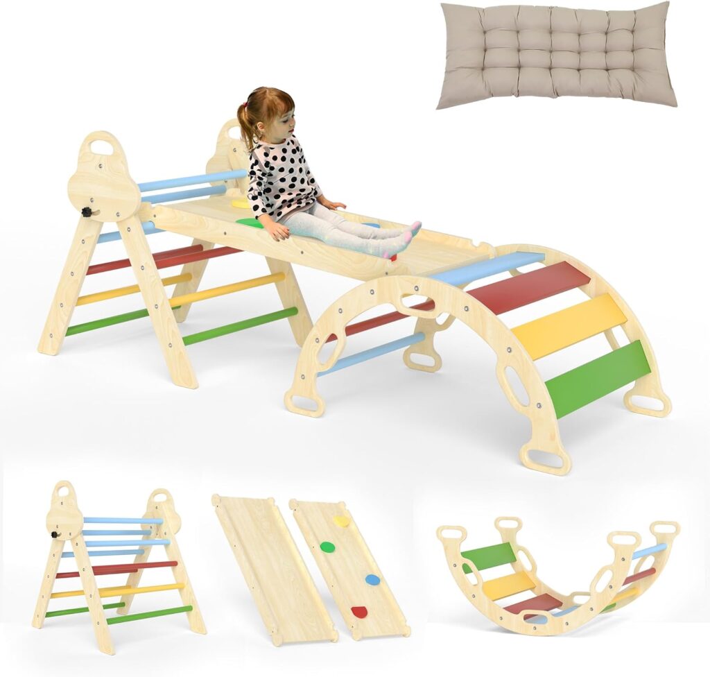 A young girl slides down a wooden playset with colorful bars. Insets show the playset in ladder, slide, and rocker configurations, plus a beige cushion.