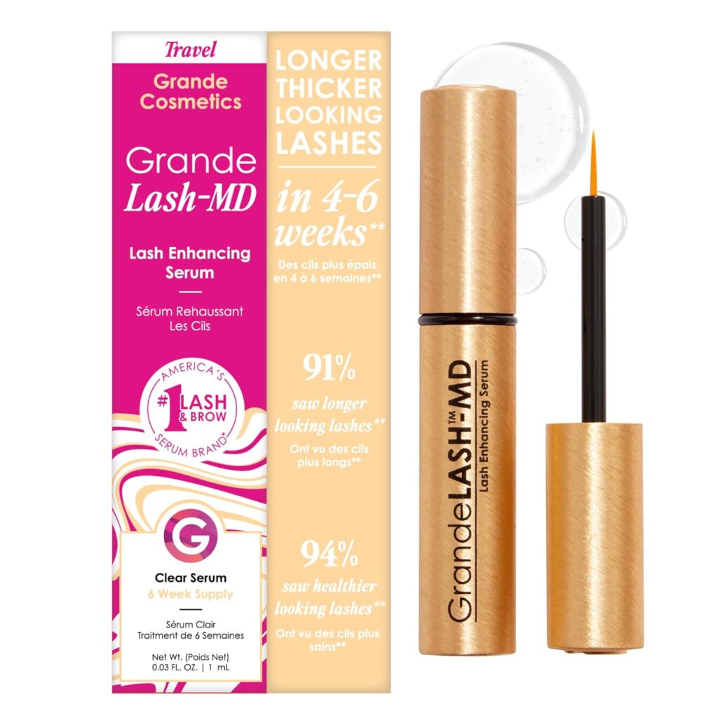 GrandeLASH-MD Lash Enhancing Serum packaging and open gold tube with applicator brush; claims fuller, longer lashes in 4-6 weeks and features product details in English and French.