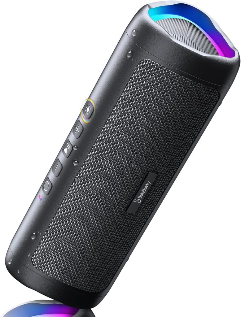Black portable Bluetooth speaker with mesh front, several side buttons, and glowing LED light rings on both ends. The speaker is positioned diagonally against a white background.