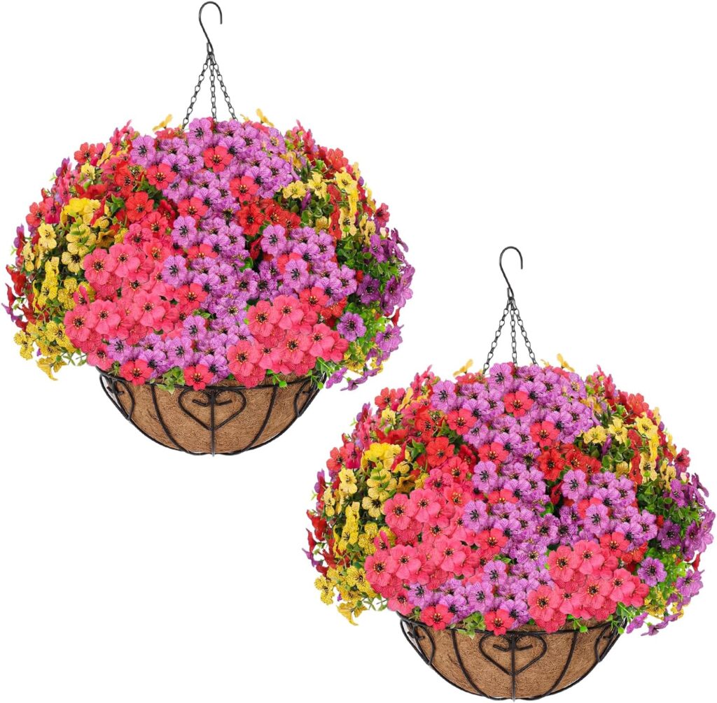 Two hanging baskets filled with colorful blooming flowers, including pink, purple, yellow, and red blossoms, in brown coco liners with black metal frames and chains for hanging.