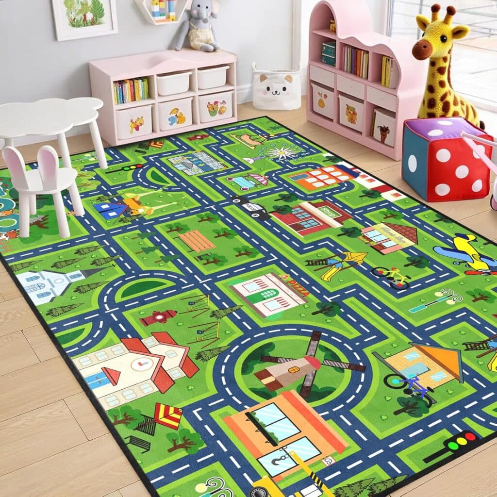 Colorful children's playroom with a green road-themed play rug, white table with bunny chairs, pink bookshelf, plush giraffe, and toys. Wall art and wooden floor complete the cheerful, organized space.
