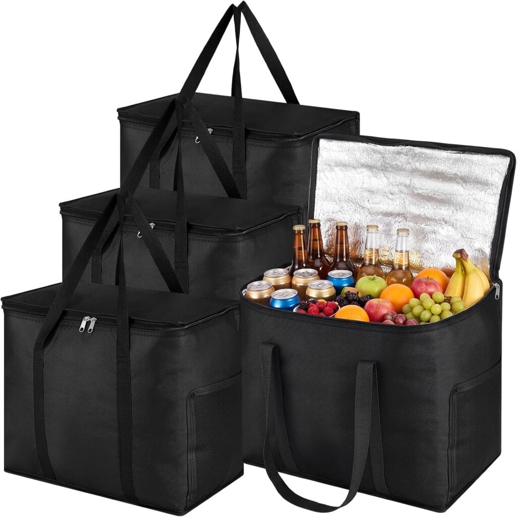 Four black insulated grocery bags, one open to show bottles, cans, and assorted fruits like bananas, grapes, apples, and oranges inside, while the other three bags are closed—perfect for stocking up on your favorite groceries during Friday Deals.