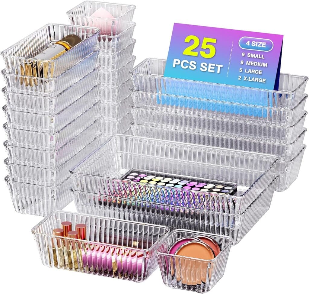 Clear plastic drawer organizers in various sizes hold makeup and cosmetics, including lipstick, brushes, and blush. A colorful card in one bin reads “25 PCS SET” and lists the quantity of each size included—perfect for keeping your beauty essentials tidy, especially during Friday Deals.