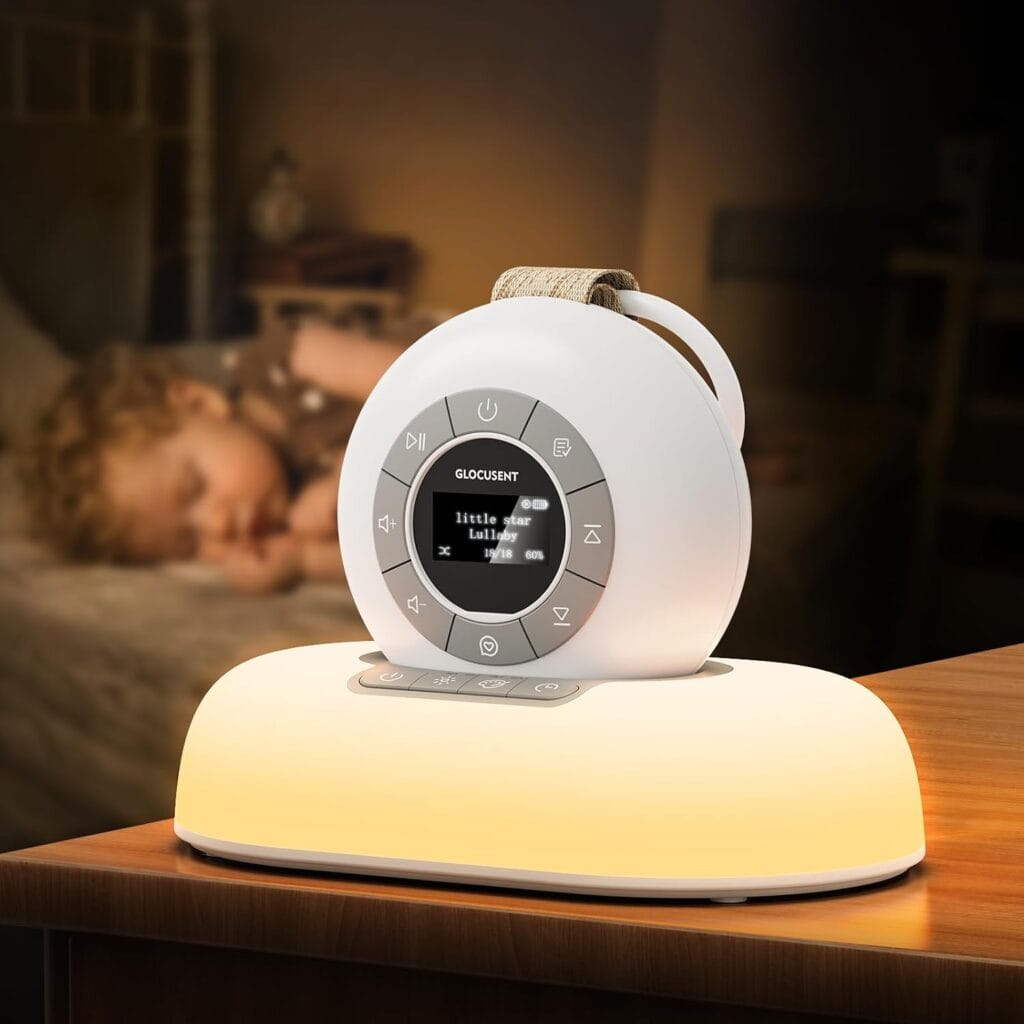 A round white night light and white noise machine sits on a glowing base on a table, with a toddler sleeping in bed in the blurred background. The device’s screen displays “Little Star Lullaby” as the current song. Enjoy soothing nights and peaceful sleep—now available for 50% off.