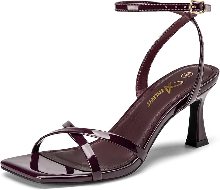 A stylish dark purple heeled sandal with a square toe, crisscross front straps, and a thin ankle strap with a buckle, these Athlefit Kitten Heels offer timeless elegance and comfort for women—now available at 66% off.