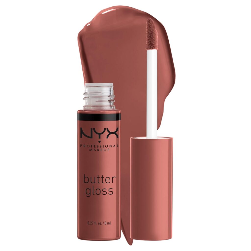 An open NYX Professional Makeup butter gloss tube with a doe-foot applicator, showing a swatch of glossy, rosy-nude lip color behind it.