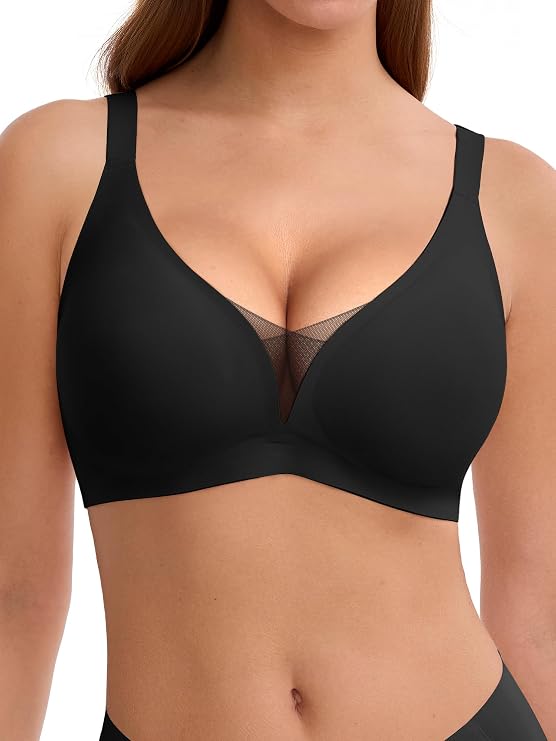 Woman wearing a black wireless bra with mesh detail at the center, featuring smooth cups and adjustable straps. The image is cropped from the shoulders to the upper waist.