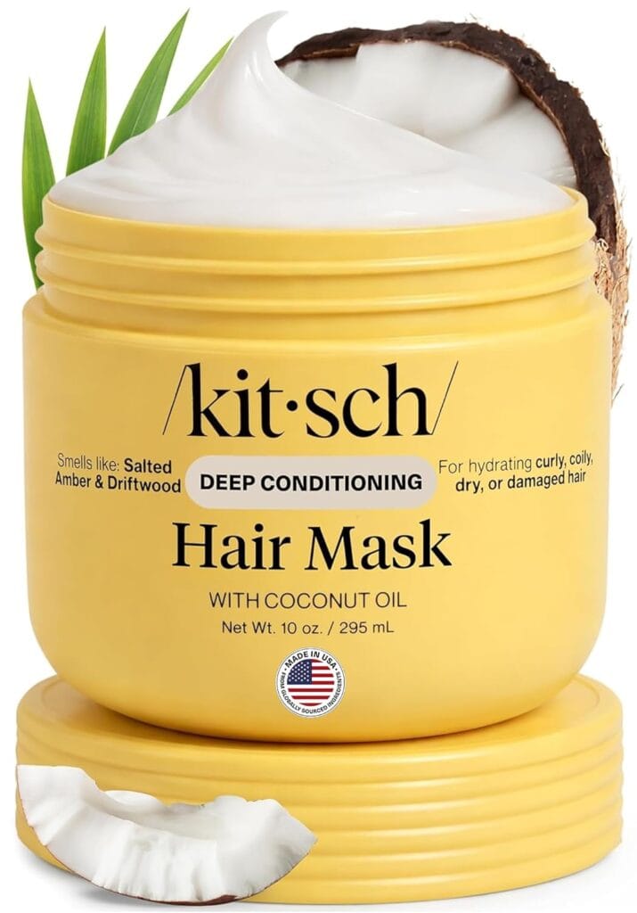 A yellow jar of Kitsch Hair Mask with coconut oil, showing creamy product inside, a coconut half, and green leaves. The label mentions deep conditioning and hydration for curly, coily, dry, or damaged hair—perfect for reviving your locks just in time for the latest Monday Deals.