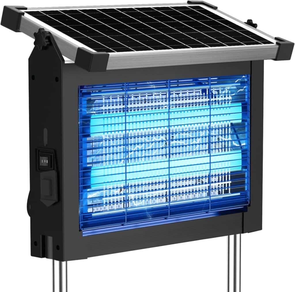 A solar-powered bug zapper with a blue UV light grid, on metal stakes for outdoor use. The device has a switch on the side and a solar panel on top for energy.
