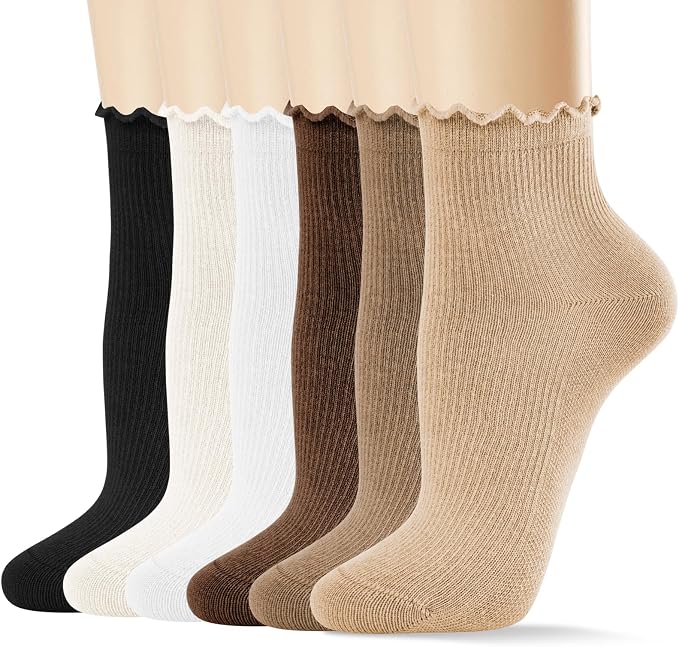 Six pairs of ribbed ankle socks in black, white, light brown, dark brown, tan, and beige, displayed on mannequin feet with scalloped edges at the top.