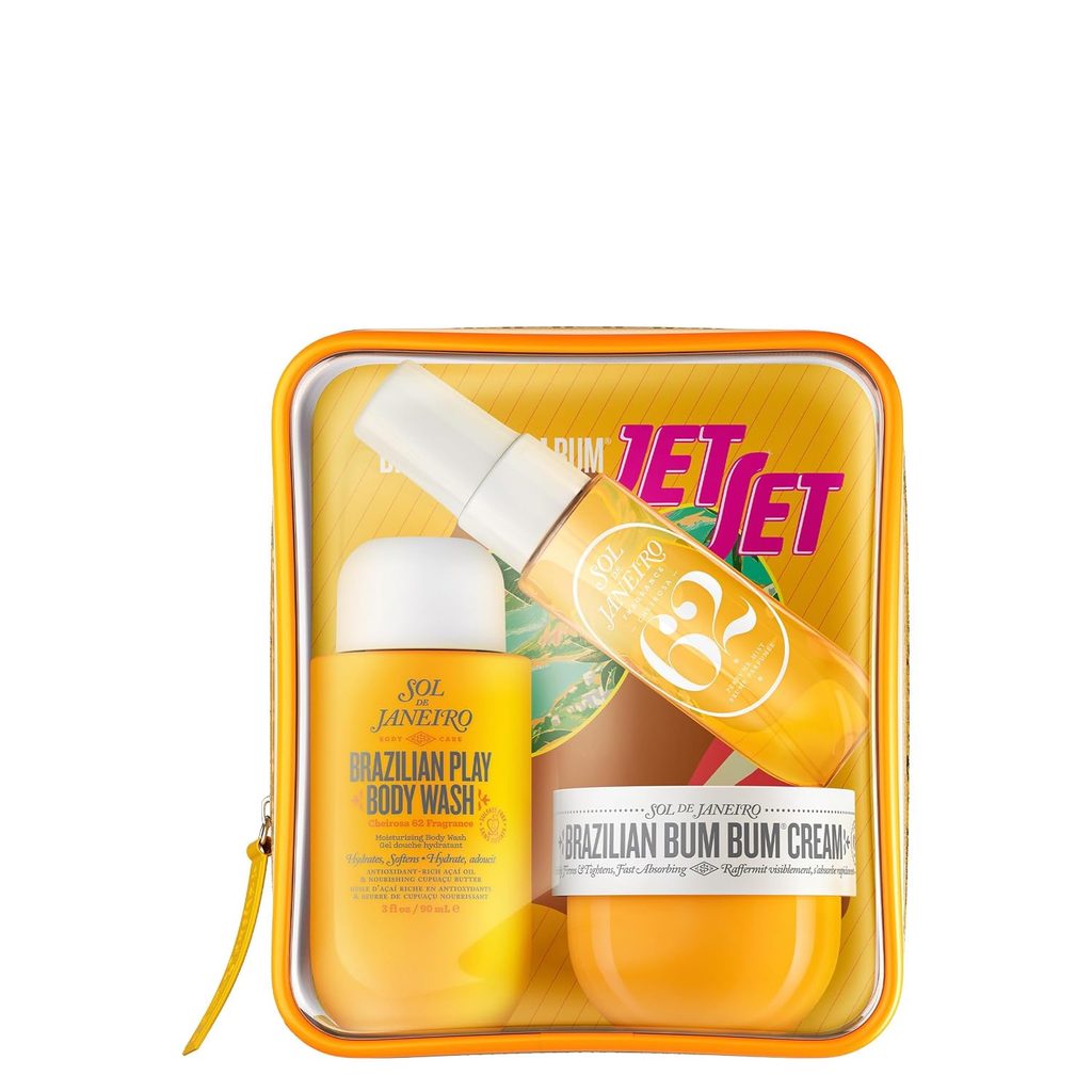 Sol de Janeiro Jet Set kit with Brazilian Play Body Wash, Brazilian Bum Bum Cream, body spray, and postcard in a clear zippered yellow pouch.