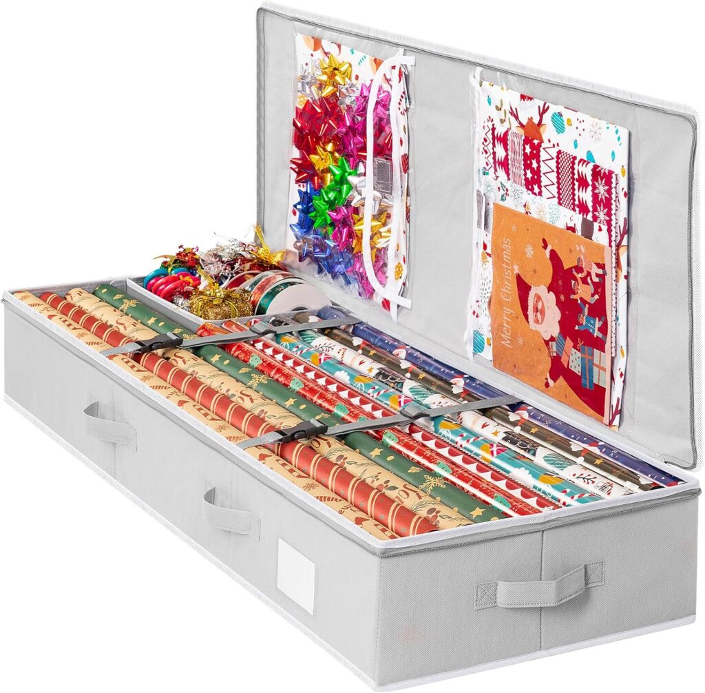 A gray storage box holds rolls of wrapping paper, ribbons, bows, tape, and assorted gift bags, organized neatly with clear dividers inside and storage pockets on the lid.