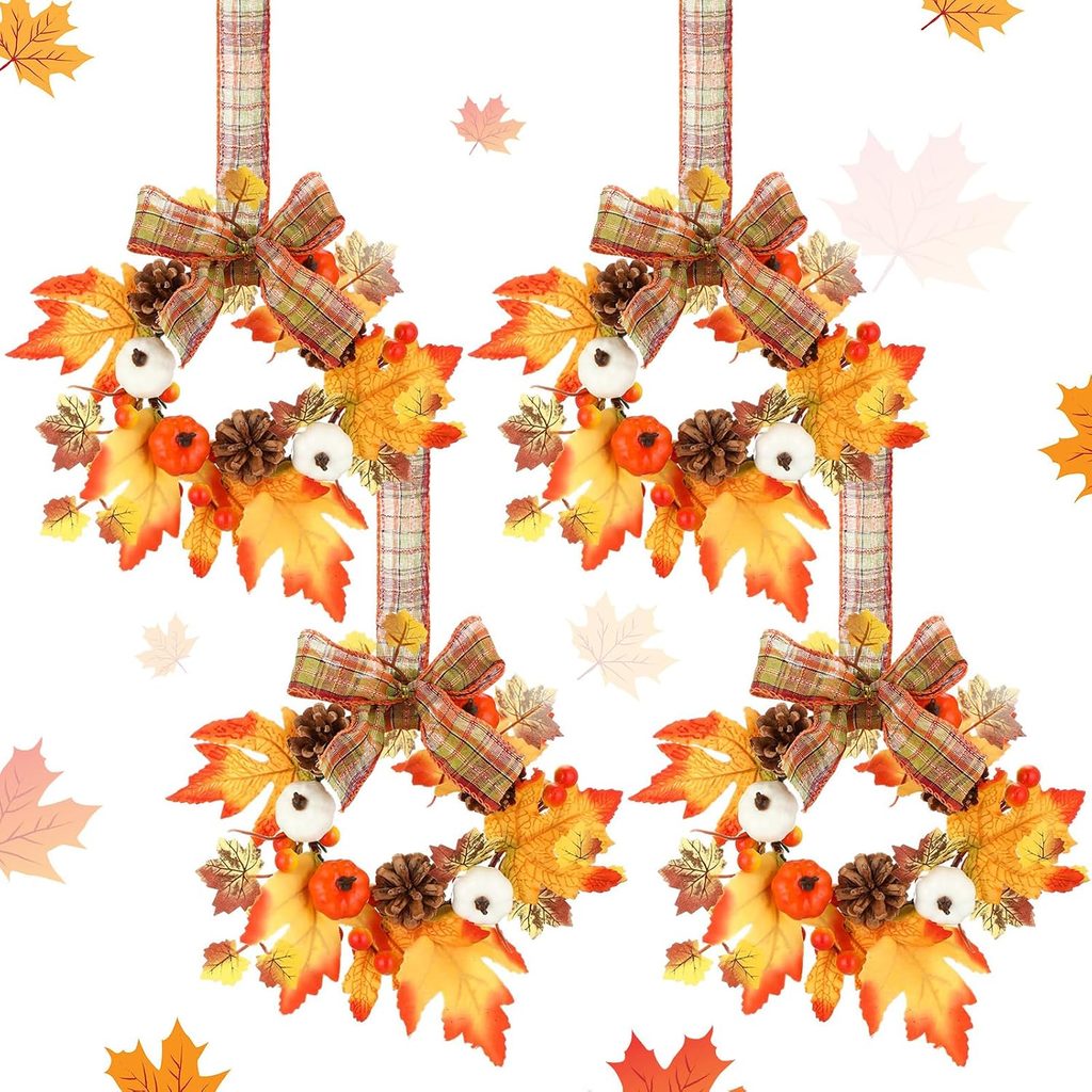 Four autumn wreaths with plaid bows, pinecones, white cotton, berries, and colorful fall leaves, arranged in a grid on a white background with scattered illustrated leaves—perfect for refreshing your décor during Thursday Deals.