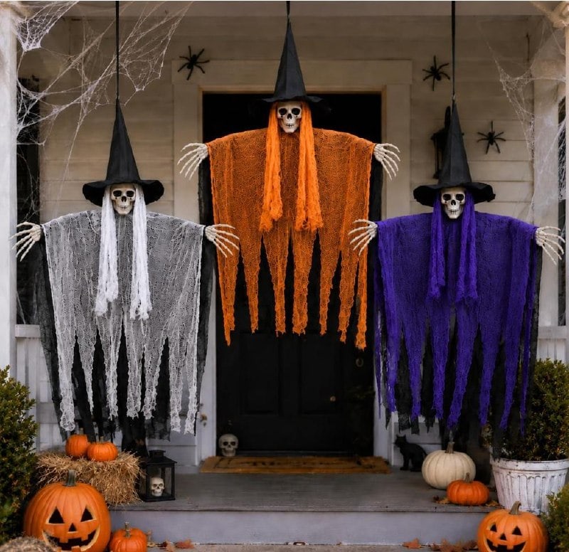 A set of three white Halloween ghost decorations for the yard or porch, featured in our Tuesday Deals.