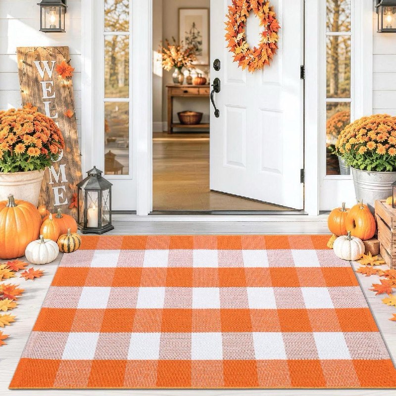 A buffalo plaid front door rug for a fall porch, featured in our Monday Deals.