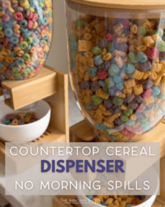 Two clear countertop cereal dispensers filled with colorful cereal above a white bowl. Text overlay reads: “COUNTERTOP CEREAL DISPENSER. NO MORNING SPILLS.”.