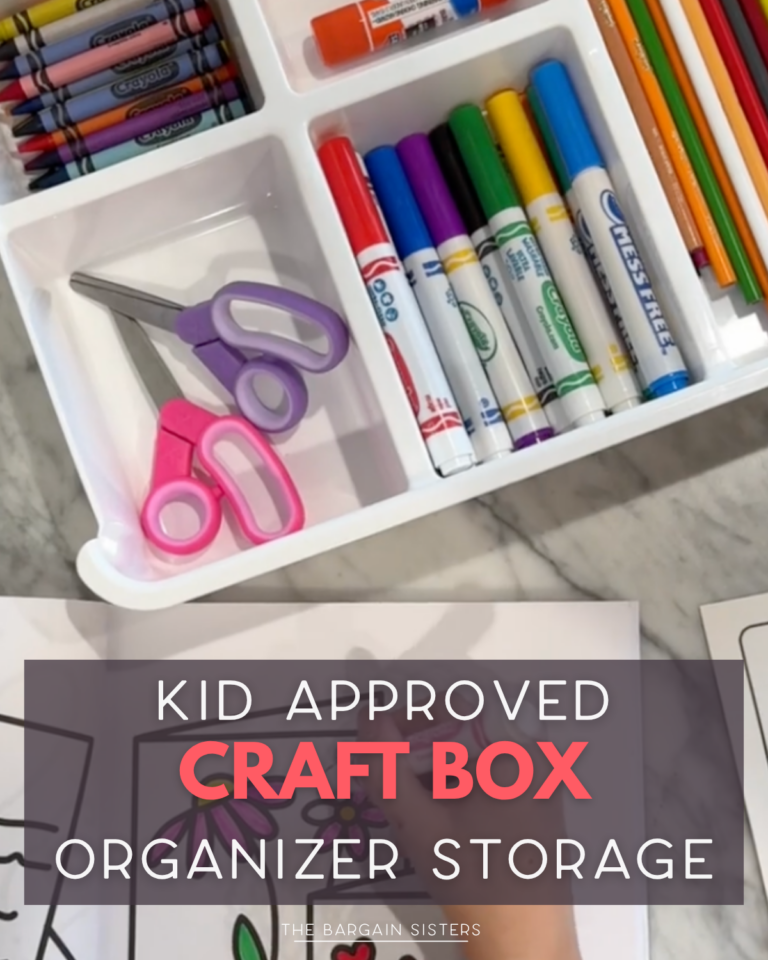 A craft box with crayons, markers, scissors, and coloring sheets sits on a marble surface. Text reads: “Kid approved craft box organizer storage.”.