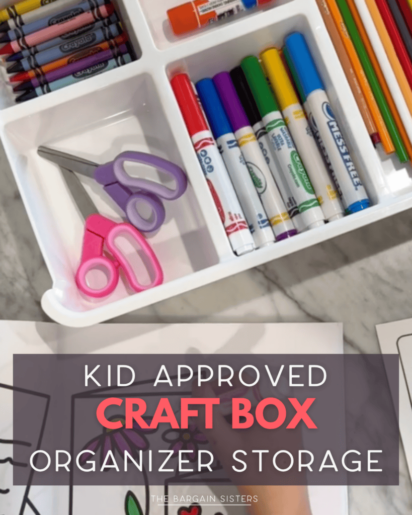 A craft box with crayons, markers, scissors, and coloring sheets sits on a marble surface. Text reads: “Kid approved craft box organizer storage.”.